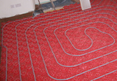 Vloerverwarming gebruiken in een oudere woning op hybride warmtepomp